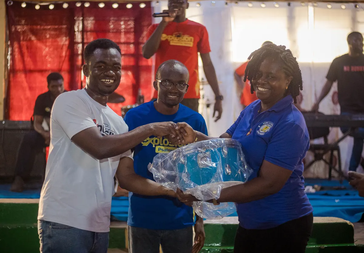 Gift presentation at the Praise Explosion worship event